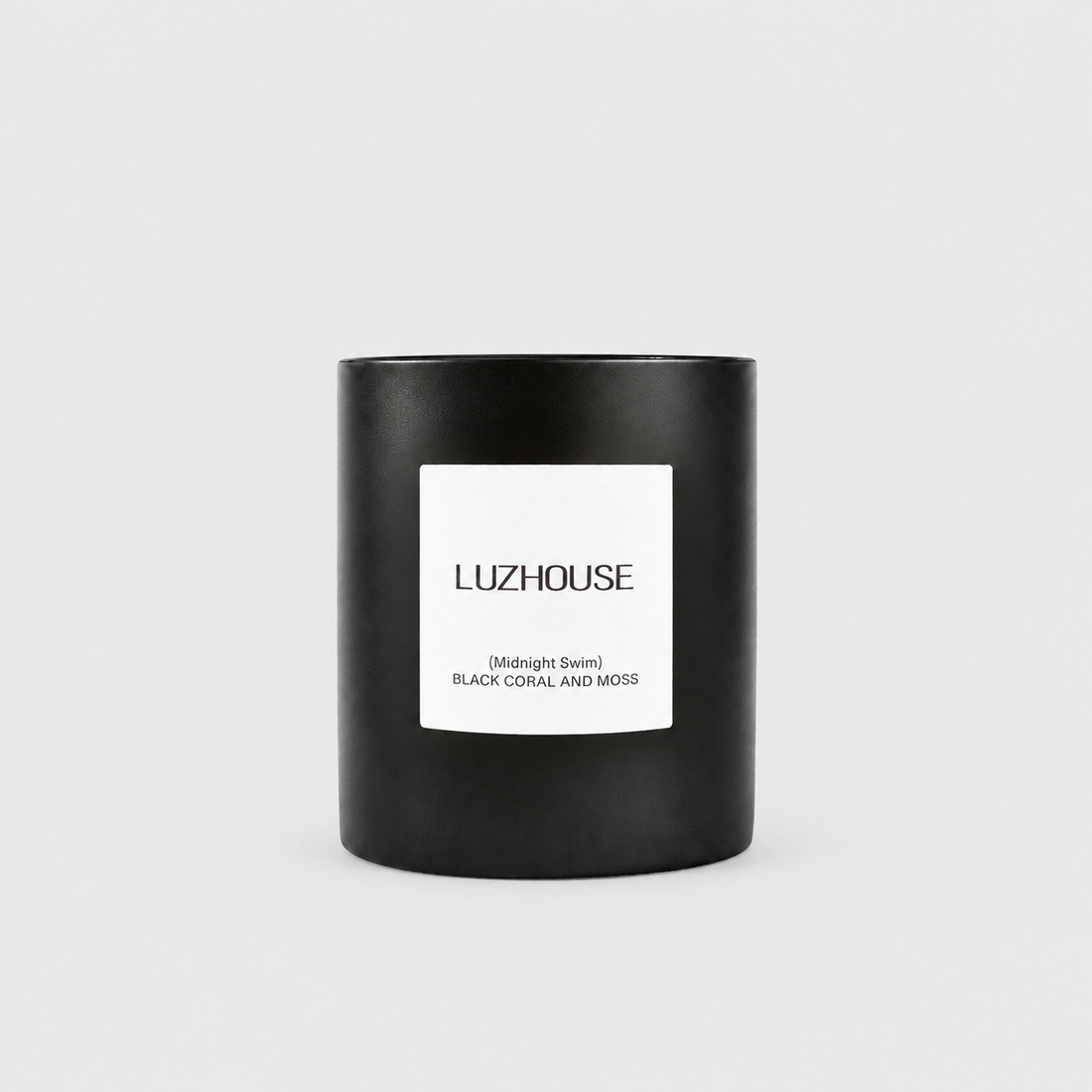Midnight Swim Candle on a light gray background